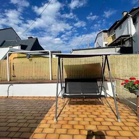 Taking A Breather On The Rooftops Of